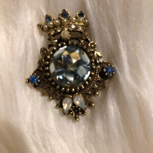 Elegant Gold and Blue Brooch